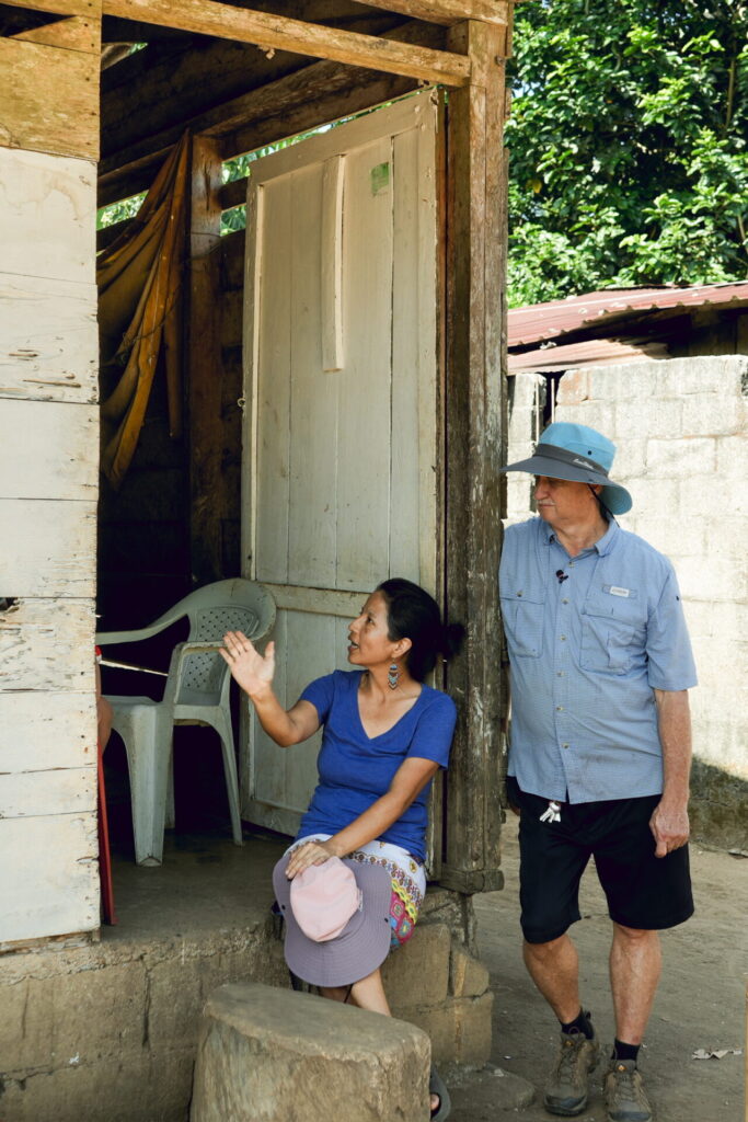 Kenny Morris and Malala, an indigenous Panamanian Missionary, share Bible stories with the people of Jacqué.